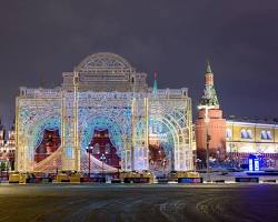 beautifully decorated city square with illuminated arches