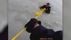 Toledo police fall through thin ice rescuing boy from pond