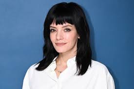 Lily Allen Wears Dress Adorned with Receipts and Lyrics While Singing About Infidelity Following David Harbour Split