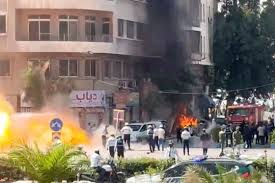 Explosions rock Damascus as French President Macron visits Syria