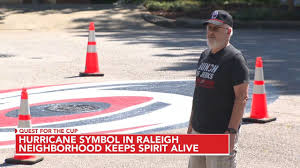 Raleigh Neighborhood's Creative Tribute: Hurricanes Fandom Painted on the Streets