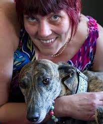 DOG&#39;S DAY: Greyhound Protection League co-founder Belinda Lewer with her pet Garnet, an ex-racing dog. - 8167296