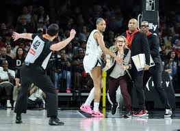 Aces coach Becky Hammon ejected after erupting on officials over missed call on A'ja Wilson in loss to Dream