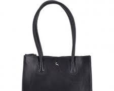 Image of sleek, minimalist vegetable tanned leather tote bag with a warm honey hue