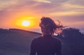 Image result for woman walking into the sunset picture