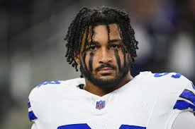 Cowboys Players Leave Flowers at Marshawn Kneeland’s Locker After His Shocking Death: ‘Love You Dawg’