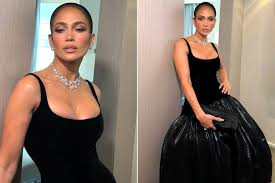 Jennifer Lopez Wears Dramatic Black Dress and Dazzling Bling to Attend Taylor Swift and Travis Kelce's Wedding