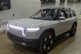 Rivian Stock Jumps as Sales Defy EV Slowdown