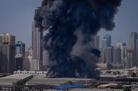 Dubai’s carefully built image as sun-filled safe haven shattered by Iranian strikes