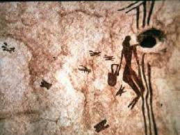 The oldest record of honey collecting dates back to 8,000-10,000 years ago. Cave drawing depicting a person climbing a rope ladder on the edge of a cliff and collecting honey from a dangerous bee nest. Cuevas de la Araña (Spider Cave). Valencia, Spain.