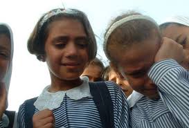 The classmates of Raghda al-Assar (10) cry on losing their close friend. Raghda died Wednesday overnight of wounds she sustained two weeks ago after having ... - sami483