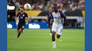 Sole player who lives in Haiti awaits US visa as his squad prepares for the World Cup in Florida