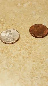 Image result for cutting out the profile of lincoln from a penny