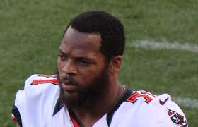 Seattle Seahawks player Michael Bennett is being sued after allegedly abandoning his boxer puppy at the Lucky Dog Daycare &amp; Resort in Tampa, Fla. - MichaelBennettBoxerPup