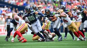 Seahawks vs. 49ers props, NFL playoff odds at DraftKings: Target Zach Charbonnet, Christian McCaffrey