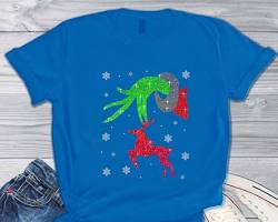 Image of someone in shorts and a tshirt holding a snowflake