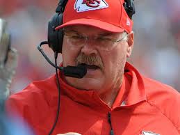 Kansas City Chiefs coach Andy Reid walks the sidelines during a game against the Dallas Cowboys at Arrowhead Stadium in Kansas City on Sept. 15, 2013. - 1379463220000-andy-reid