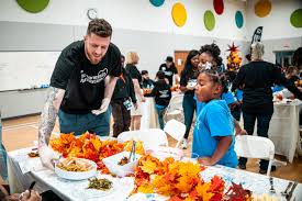 Thunder Players Give Back to the Community for Thanksgiving
