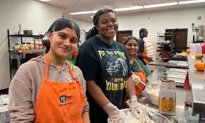 Young People Lead Charge Against Food Waste, Transforming Surplus into Millions of Meals