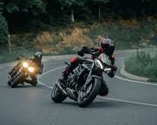 Immagine di motorcycle riding through the streets of Salzburg