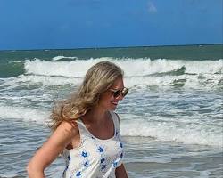 woman wearing a resort dress by the seaの画像