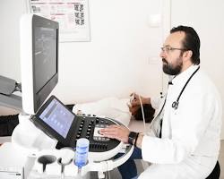 Obraz: Badanie USG tarczycy z biopsją cienkoigłową