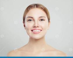 Image of someone smiling with clear skin