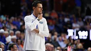 A graphic showing the top five teams in the AP Preseason College Basketball Poll with Florida at number one.
