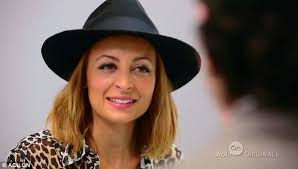 Hats off: The first episode of Candidly Nicole shows the reality star head to a tattoo removal clinic where she enquires about getting her tramp stamp ... - article-2317386-19900E97000005DC-668_634x361