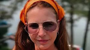 Buffy legend, 56, has barely aged as she almost spills out of bikini