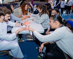 Image of BUE dental team interacting with special needs students