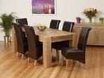 Solid oak dining table and chairs