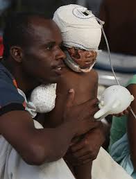 At top, babies at God&#39;s Littlest Angels Orphanage in Pétionville. A staff member, bottom, fed children at the orphanage. Ruth Fremson/The New York Times - Haiti-CH03-02mediumP2