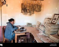 Image of Cambodian paper mache artisan at work