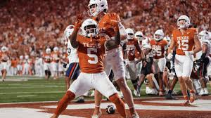 Trump on hand as Manning and No. 1 Texas face Uncle Peyton's old team in 1 of 6 Top 25 matchups