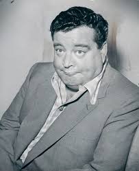 Jackie Gleason, star of one of the funniest televsion shows ever, The Honeymooners, takes a break from the show after hurting his ankle. - Jackie-Gleason-1954