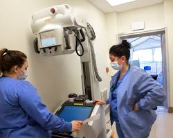 Image of radiology tech in action