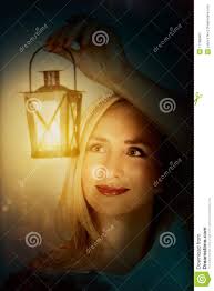 Stock Photo: Woman with light lantern - woman-light-lantern-17168940