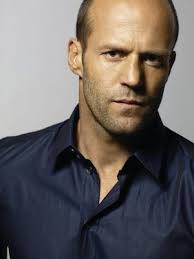 Jason Statham was born in Shirebrook, Derbyshire, England, as the son of Eileen and Barry Statham, a lounge singer. - Jason-Statham