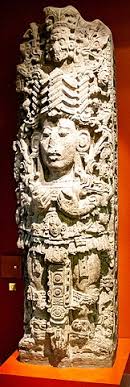 A vintage 1885 photograph of an ancient Maya statue, found deep in the jungles of Honduras.