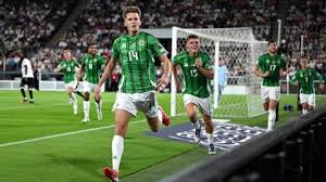 Price Stuns Germany as Northern Ireland Fight Back in Cologne