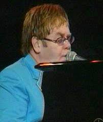 John flew into Bangalore in his private jet. His grand piano and a 30-member crew with ... - elton