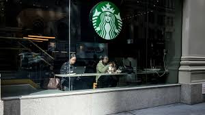 Starbucks to resume share buybacks but China shift clouds growth outlook