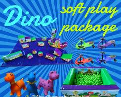 Image of team of About2Bounce staff setting up a soft play inflatable