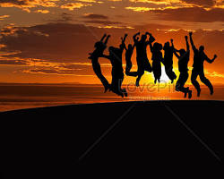 Image of person climbing a mountain with a group of people cheering them on