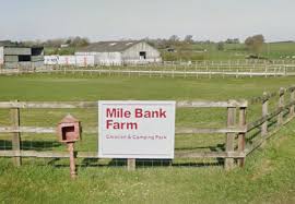 Two injured after car collides into caravan awning near Whitchurch