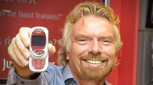 The Virgin Group, headed by billionaire entrepreneur and adventurer Sir Richard Branson, holds 72pc of Virgin Mobile. Sir Richard Branson of Virgin Group, ... - Richard-Branson