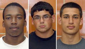 The football defensive stars, from left, are Tottenville teammates Eric James, Rocco Fama and Nick Ferraioli. game. A transfer from St. Joseph by-the-Sea, ... - 12071381-large