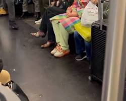 Image of person wearing sneakers suitable for the New York City subway