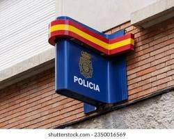 modern Spanish police station building with flags, généré par IA
